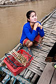 Luang Prabang, Laos - The Pak Ou Buddha Caves, Laos. Waiting for the tourists. 